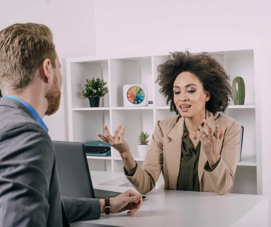 Boss and employee talking