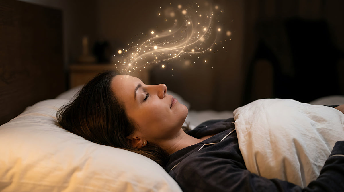 Woman falling asleep with dreamlike elements floating around her head