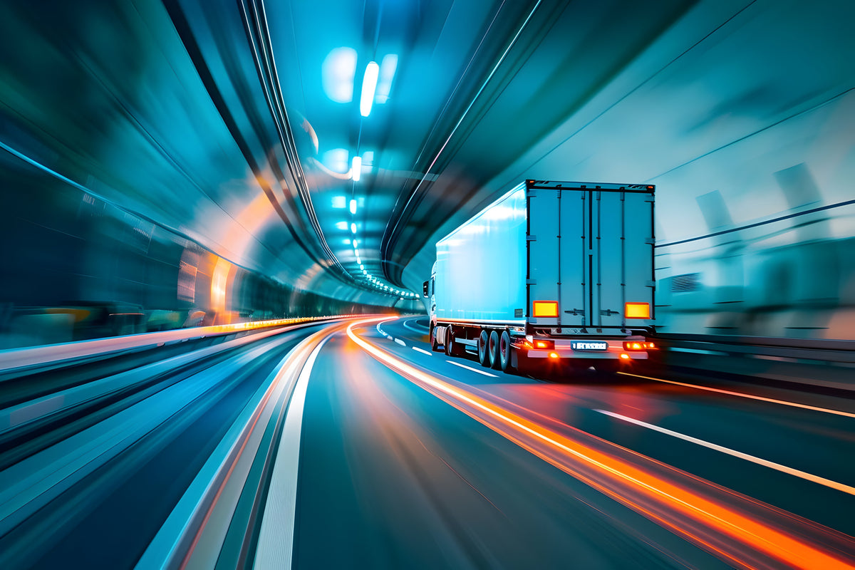 Blurry lights as truck drives in tunnel