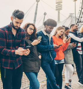 People staring at their phones instead of talking to each other