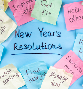 Sticky Notes with New Years Resolutions written on them.