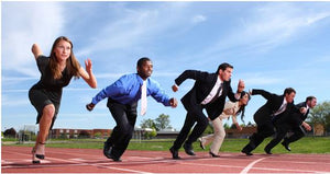 People running a race in business attire