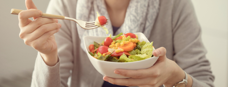 woman eating a salad
