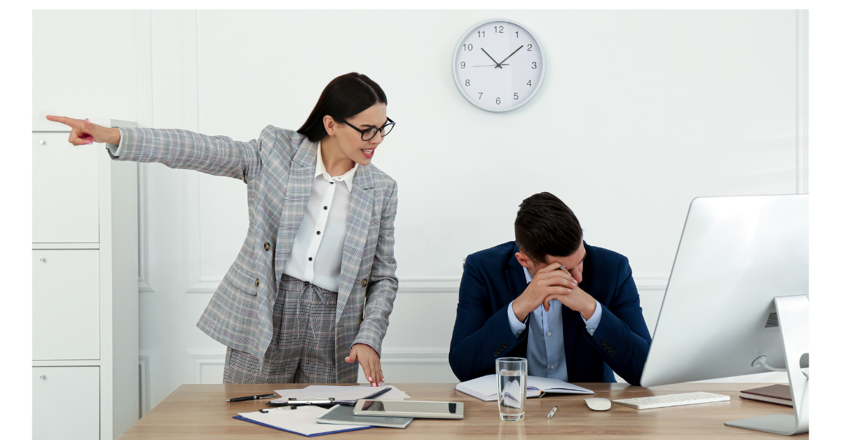 Female boss yelling at male employee