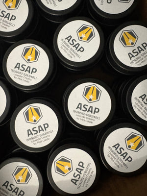 Candle tins with ASAP logo
